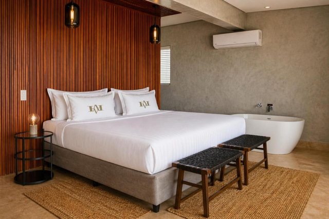 Bedroom with a freestanding bath