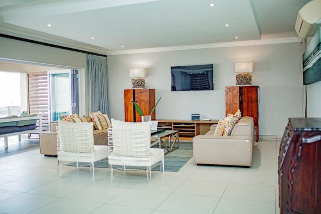 Bedroom with a glass bathroom