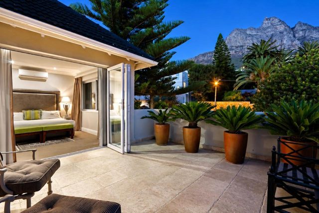 Room opening onto the terrace at dusk