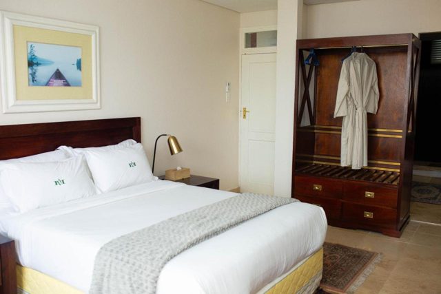 Bedroom with a double bed and wardrobe