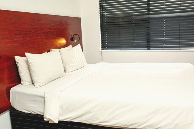 Studio bedroom with a double bed