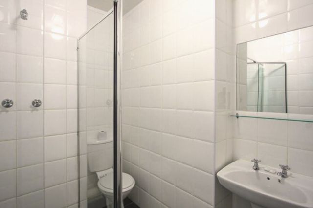 Bathroom with shower and basin