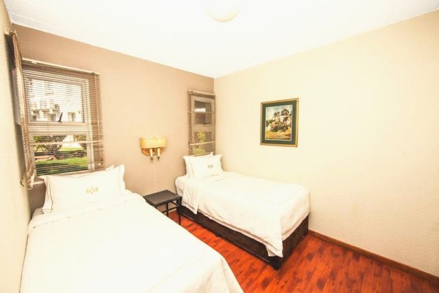 Bedroom with two single beds